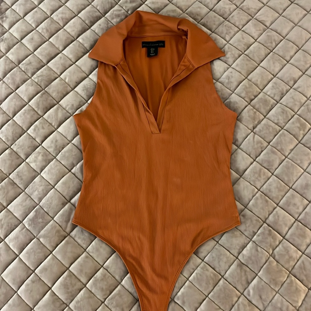 Orange collared body suit
